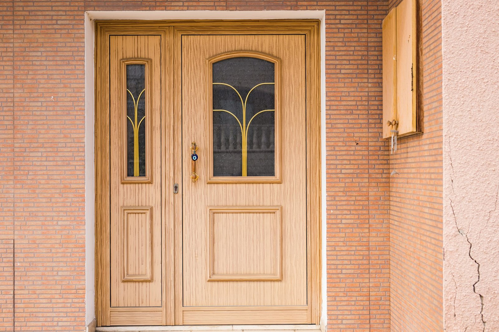 wooden front door of a home